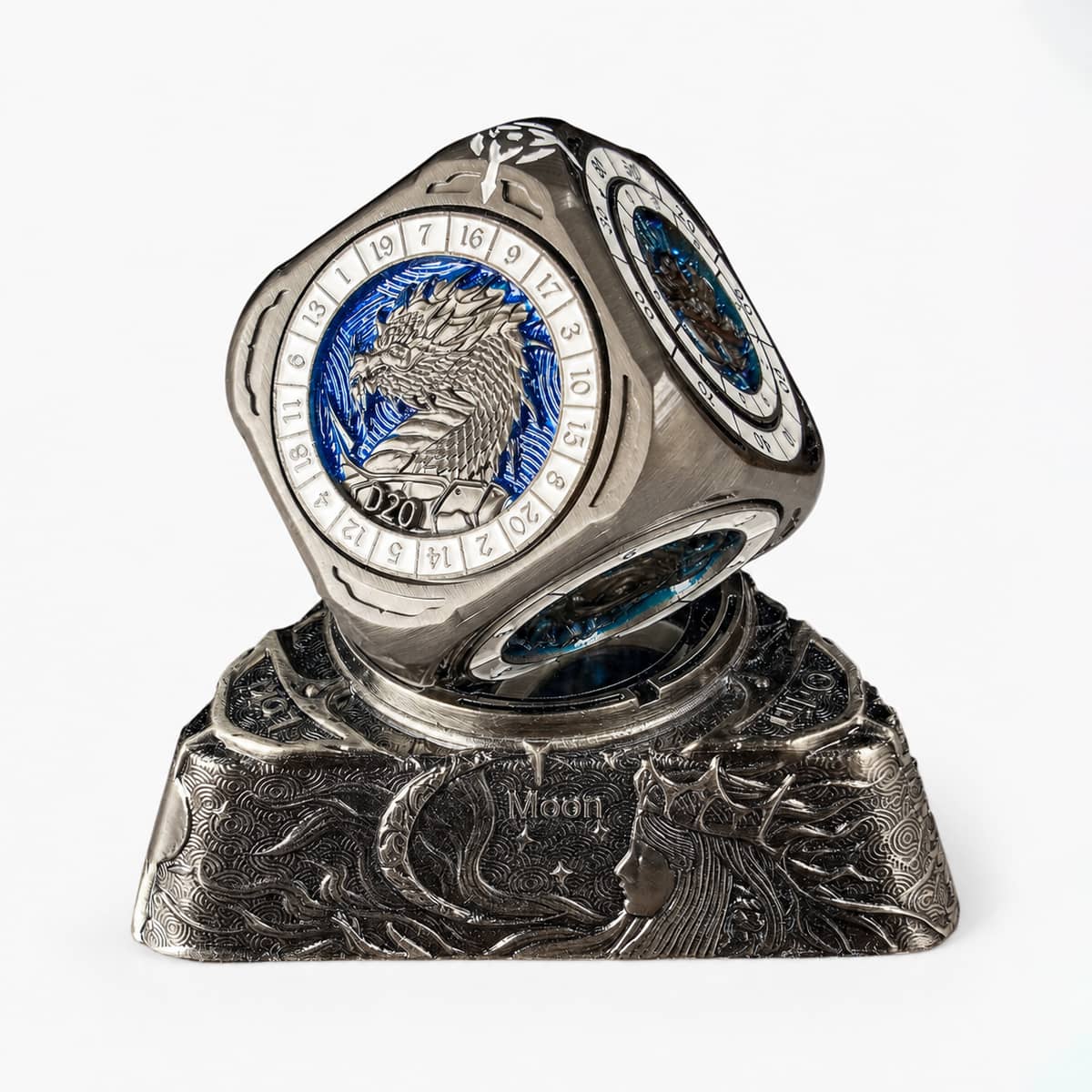 Silver and blue 7-in-1 metal RPG spinner dice on an ocean-themed dragon display base.