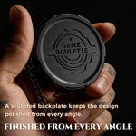 Back view of the black metal D20 decision spinner showing its sculpted game roulette plate.