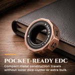 D12 magnetic decision ring beside a wallet to show its compact pocket-ready size.