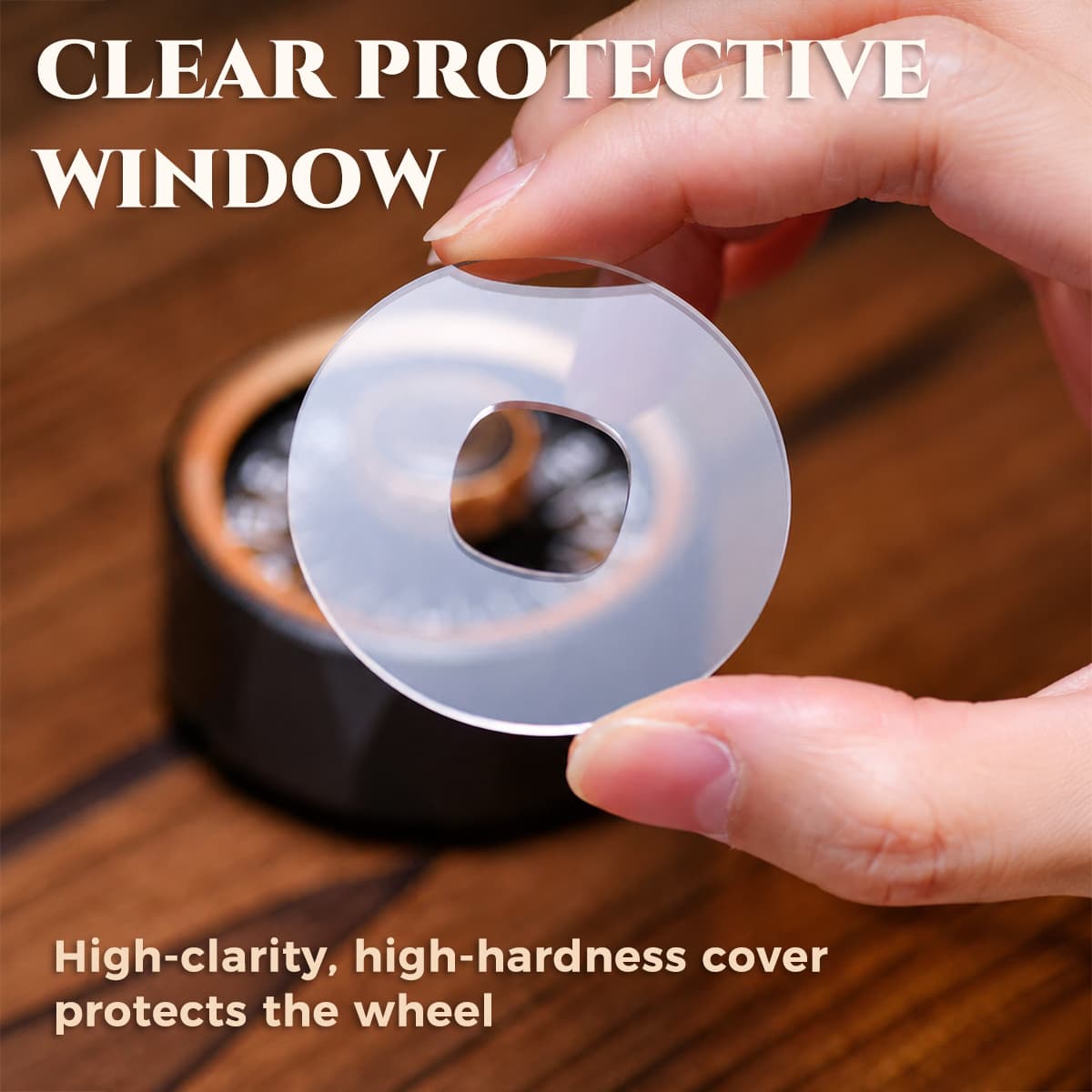 Hand holding the clear protective window above a bronze D20 roulette spinner.