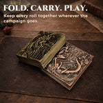 Closed antique bronze and copper dice codex books with sculpted dragon covers.