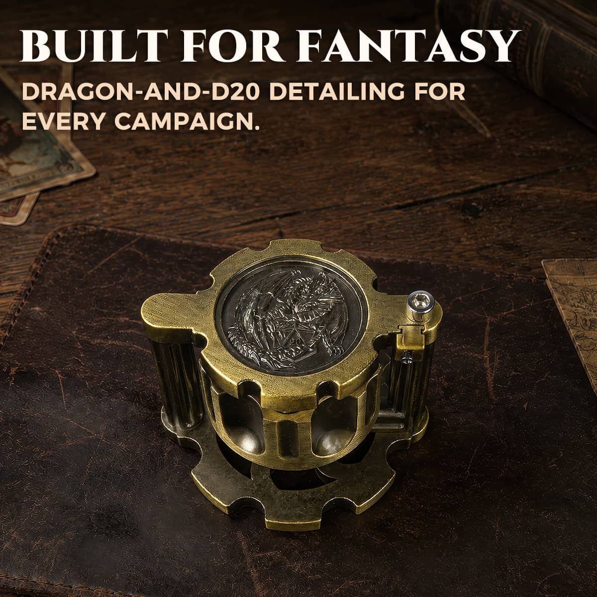 Antique gold reloadable dice cylinder showing its sculpted dragon top and rotating case.