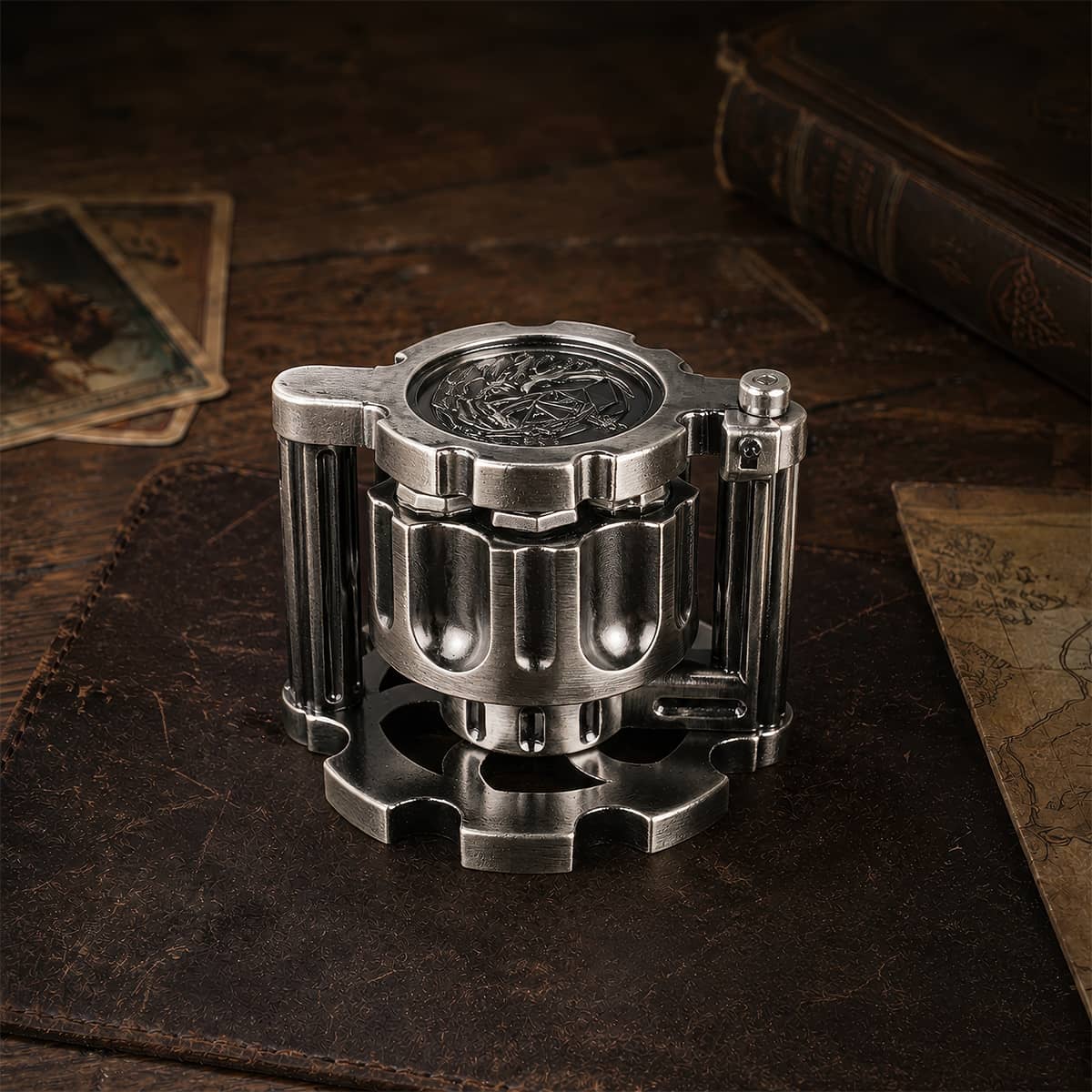 Closed antique silver reloadable metal dice cylinder standing on its display frame.