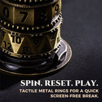 Close-up of antique bronze numbered spinner rings above the metal display base.