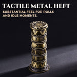 Antique bronze 7-in-1 spinner dice standing upright on a dark tabletop.