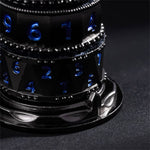 Close-up of blue-numbered metal spinner rings and the black display base.