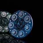 Blue 7-in-1 dragon dice spinner upright on a black reflective surface.