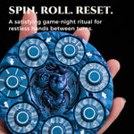 Hand spinning a blue 7-in-1 metal RPG dice spinner between game turns.