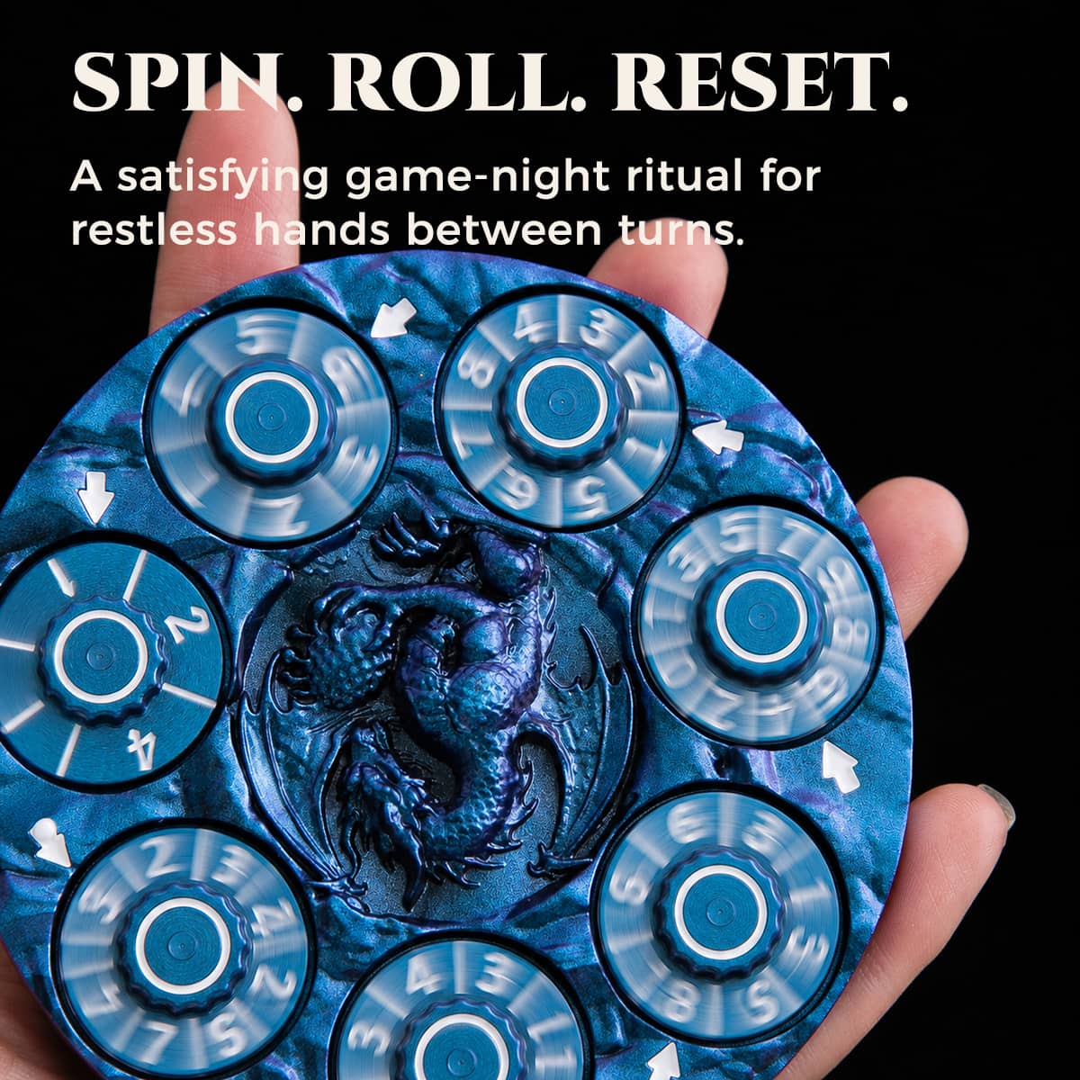 Hand spinning a blue 7-in-1 metal RPG dice spinner between game turns.