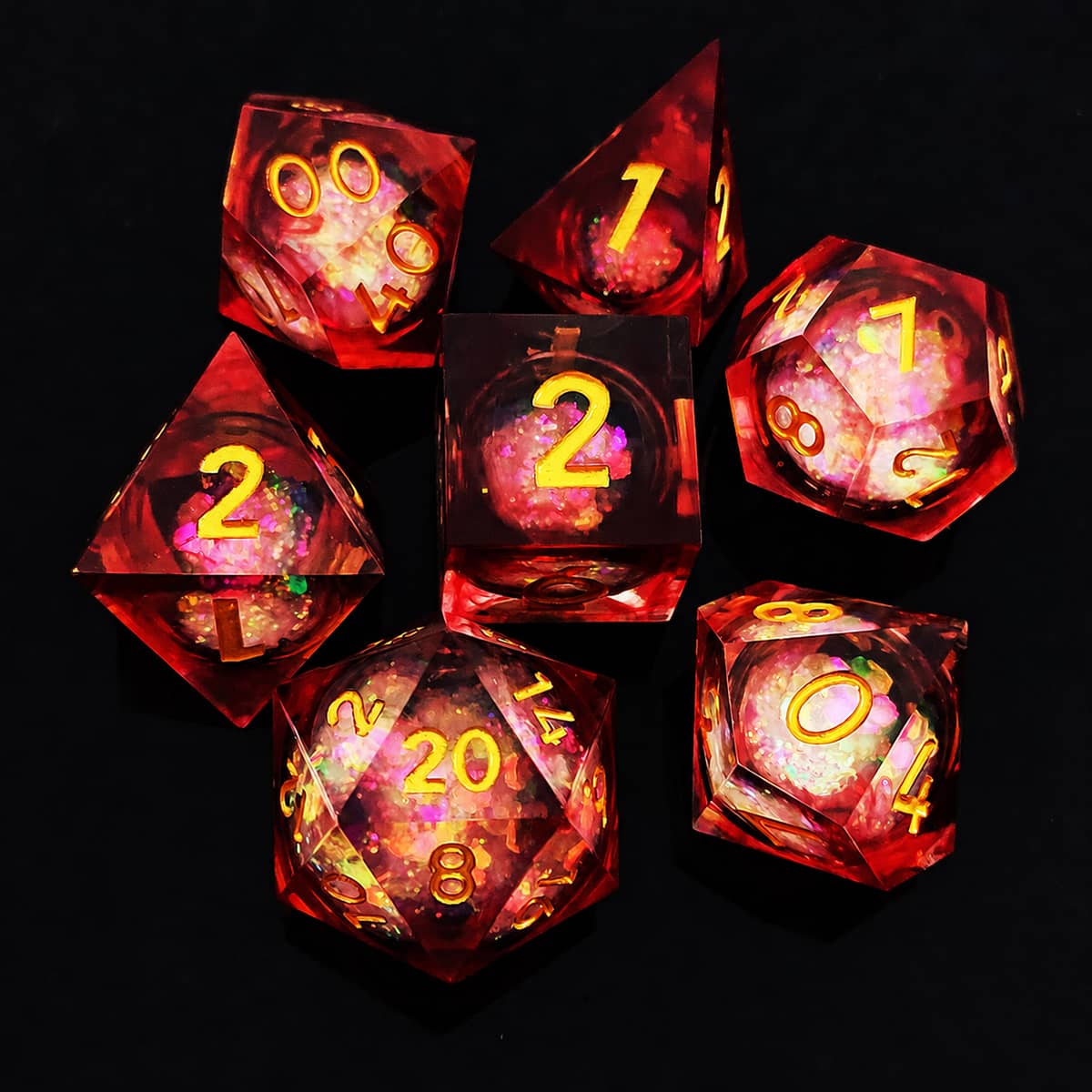 Crimson liquid-core RPG dice set with swirling red glitter and gold numbers on black.