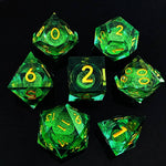 Emerald liquid-core RPG dice set with swirling green glitter and yellow numbers on black.