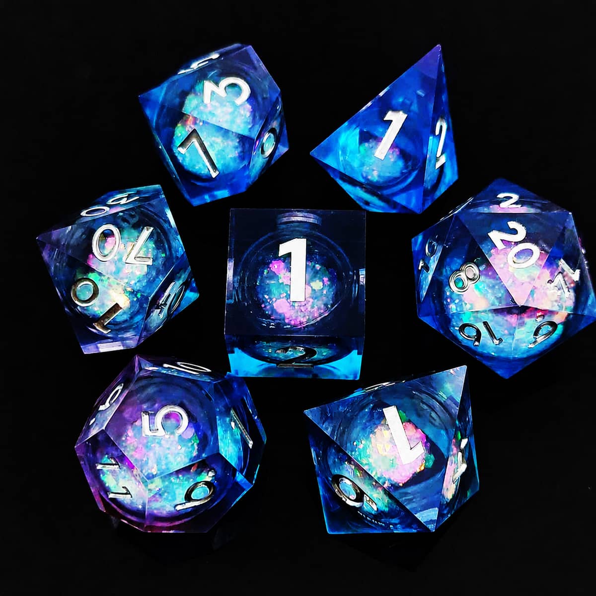 Cotton Candy liquid-core RPG dice set with blue and pink swirls and white numbers.