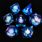 Cotton Candy liquid-core RPG dice set with blue and pink swirls and white numbers.