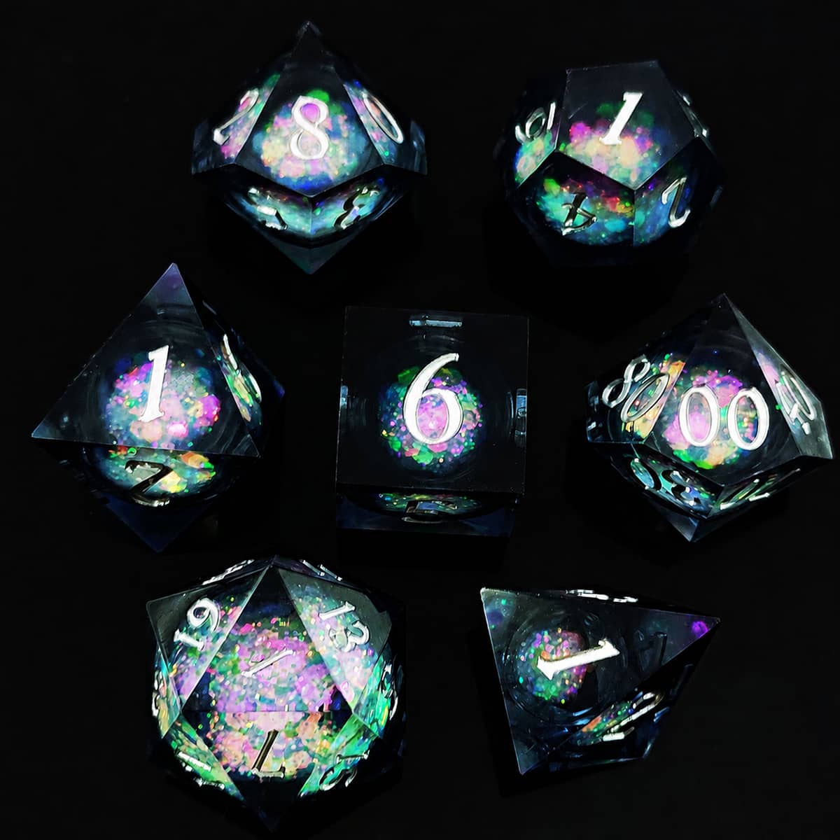 Dark Rose liquid-core RPG dice set with purple, green and pink shimmer on black.