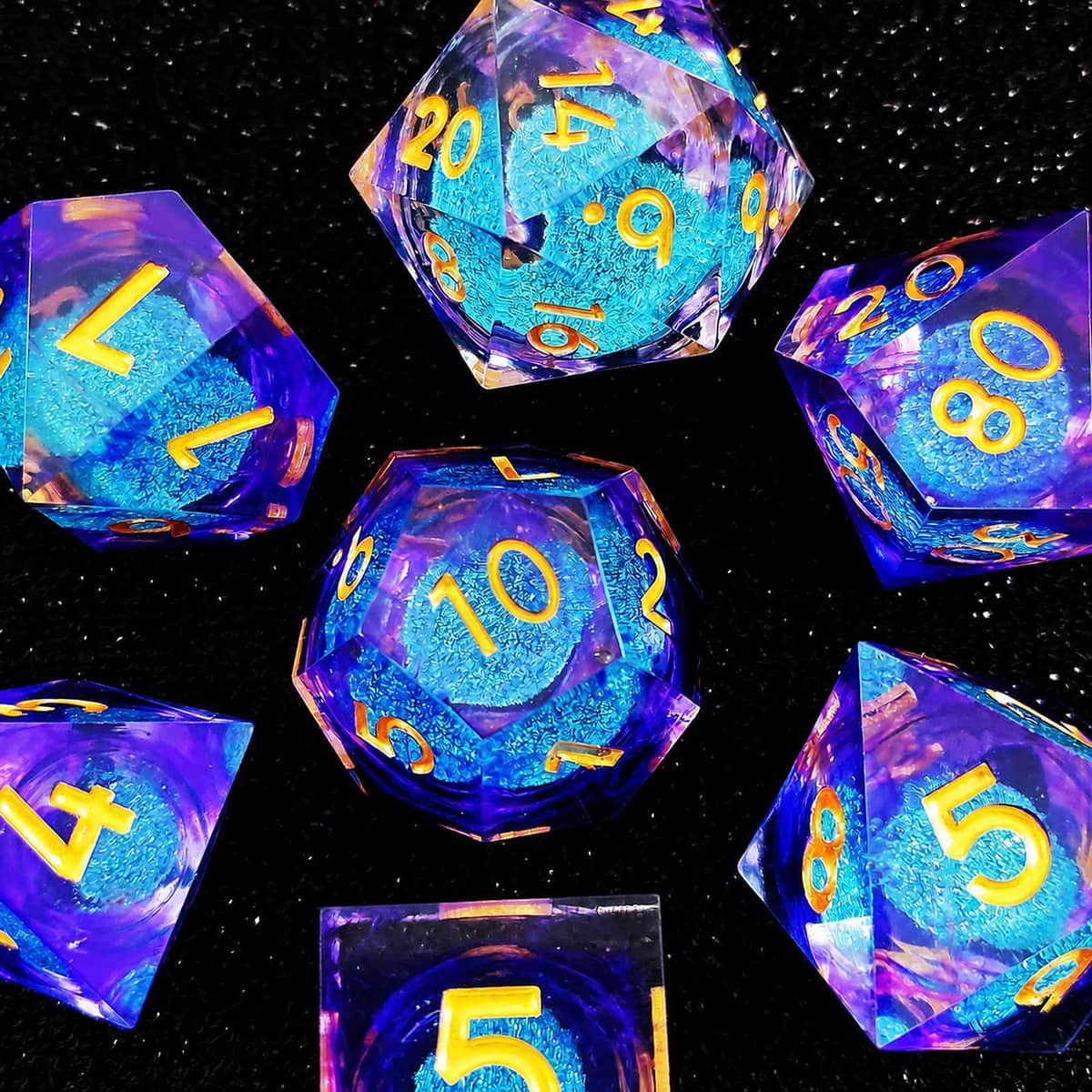 Aurora liquid-core RPG dice set with blue-purple shimmer and gold numbers on black.